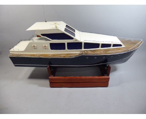 A Large Wooden Model of a Power Boat with Electric Engine and Radio Control Stering (No Control) 138cm Long 