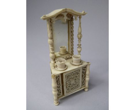 An Unusual Carved Ivory Miniature Mirror Backed Sideboard, Late 19th/Early 20th Century. Possibly a Piece of Dolls House Furn