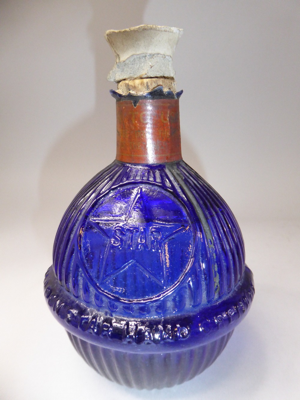 A Hardens Blue Glass Fire Grenade, "STAR". Lid Intact