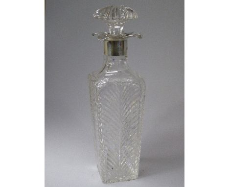 A Heavy Hand Blown Cut Glass Silver Mounted Decanter of Square Tapering Form. Silver Collar Marked For Birmingham 1910 by Tho