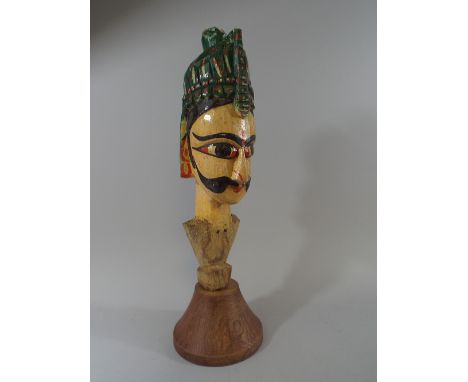 A 19th Century Carved Wood Indian Puppet Head with Original Polychrome Painted Decoration, Later Mounted on an Oak Plinth