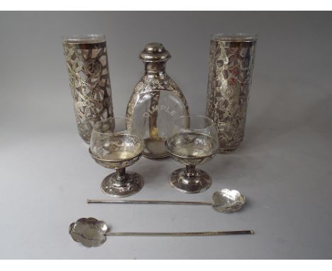 A Sterling Silver Overlaid Haig's Dimple Decanter, Two Mixers and Similar Whisky Balloons. With Two White Metal Stirrers. Pie