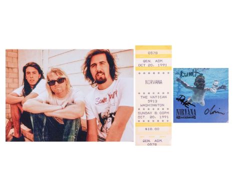 Nirvana: a band-signed 'Nevermind' CD insert, with the autographs in black ink of Kurt Cobain (1967-1994), Dave Grohl (b.1969
