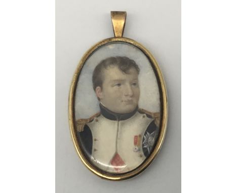 An early 19th century portrait miniature of Napoleon Bonaparte. Painted on ivory, housed in a gilt brass closed back frame wi