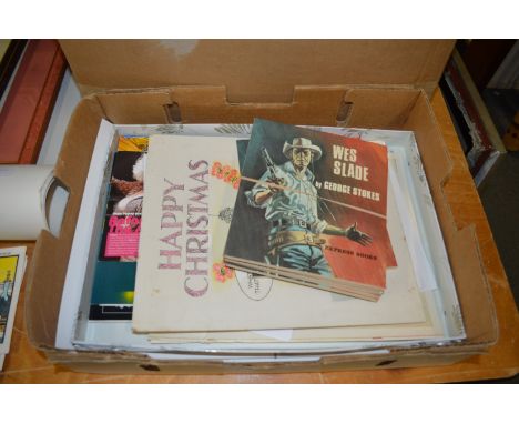 A quantity of unframed prints, postcards, books etc.
