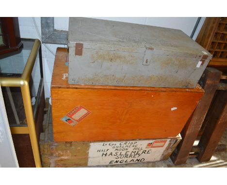 A steel ammunition trunk and two other trunks.