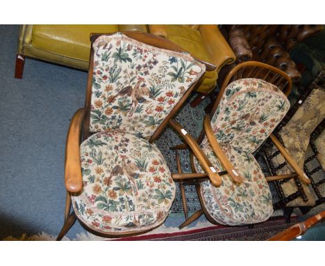 Two Ercol armchairs.