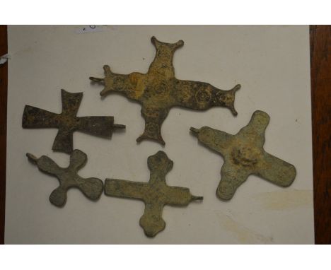 A small group of Roman bronze crosses.