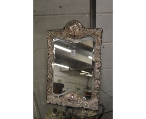 A good embossed silver strut mirror.