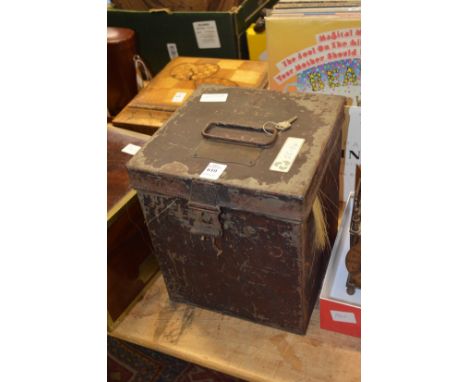A black japanned tin trunk containing military plumes.