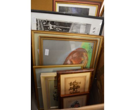 A quantity of paintings and prints.
