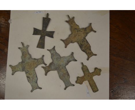 A group of Roman bronze crosses.