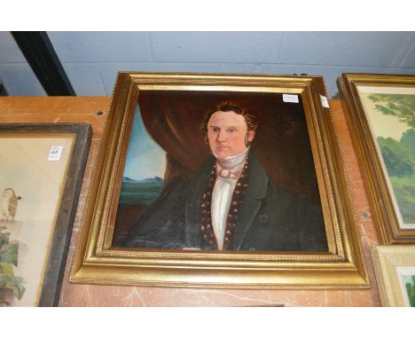 A bust length portrait of a young gentleman wearing a dark blue coat, oil on board.