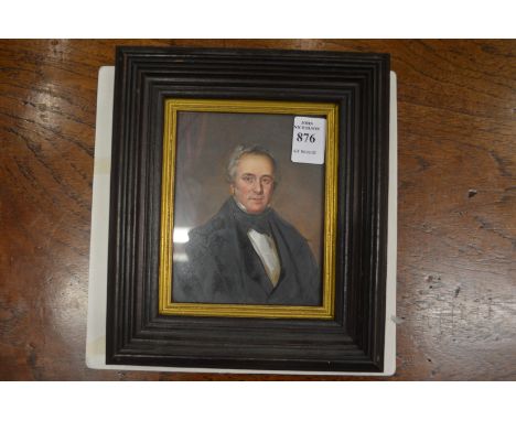 A portrait miniature of a gentleman wearing a black coat.