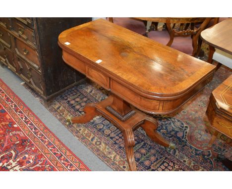 A 19th century mahogany D-shaped foldover card table on a square column support platform base with four outswept legs with br