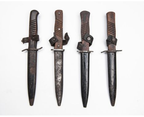 A SMALL COLLECTION OF GERMAN WORLD WAR ONE TRENCH or BOOT KNIVES,various blade types, three with Imperial marks, four differi