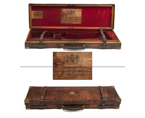 STEPHEN GRANTA BRASS-CORNERED OAK AND LEATHER SINGLE GUNCASE,fitted for 30in. barrels, the interior lined with red baize, a p