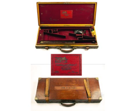 COGSWELL &amp; HARRISON LTD. - A BRASS-CORNERED OAK AND LEATHER DOUBLE GUNCASE,&nbsp;fitted for 27in. barrels, (could adapt t