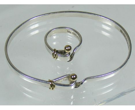 A Tiffany & Co. Silver & Gold Ring & Bangle Set