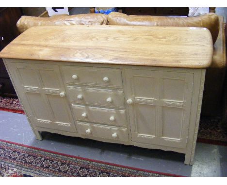 A Part Painted Ercol Elm Dresser Base
