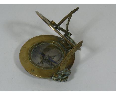 An Early 19thC. Brass Sundial Compass