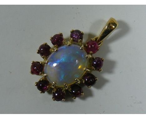 A Gold Opal & Ruby Pendant