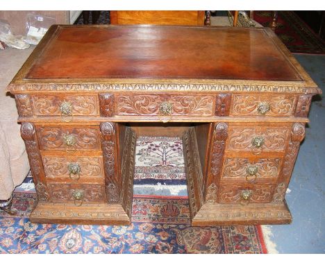 A 19thC. Leather Topped Oak Pedestal Desk With Brass Lion Head Drawer Pulls