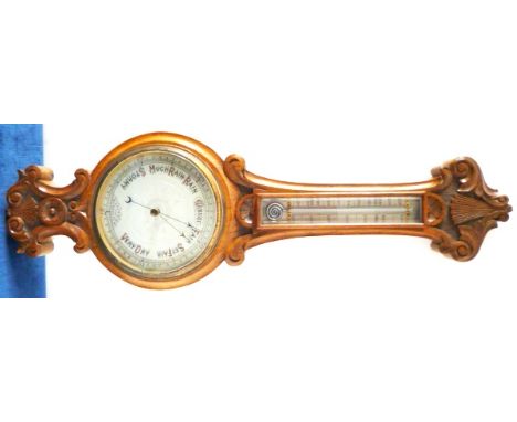 An Aesthetics oak case barometer, with thermometer to the stem