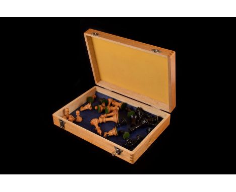 A Stauton chess set, in box wood marked with the red crown with felt bases 32 pieces
king approx 7.5cm H, approx 17.5g, dont 