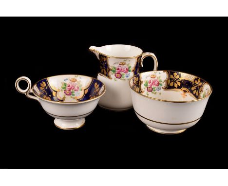 A part Fenton tea service,  circa 1925, the blue gilt design with over painted floral sprays 