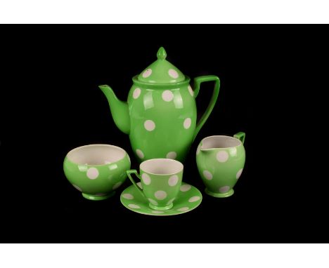 A Carlton ware coffee set, having green ground with white spot decoration, marked RdNo721741 to base, comprising coffee pot, 