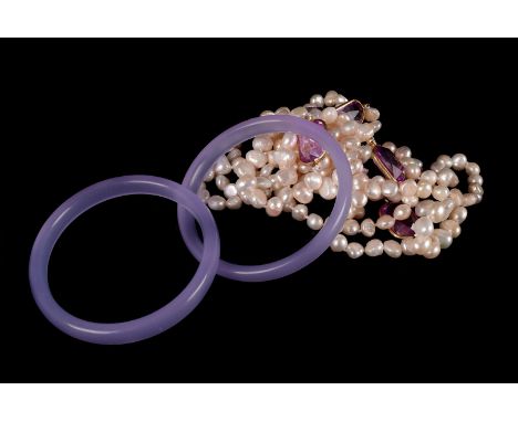A Fresh water pearl and paste necklace, together with two lavender Jade bangles.(3)