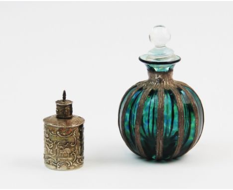 A 20th century silver topped scent bottle, (marks indistinct), the turquoise glass body of pomegranate form, with segmented m