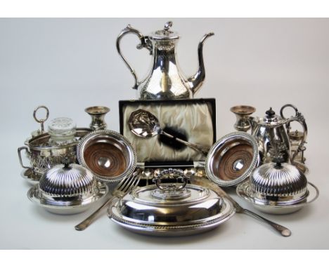 A collection of silver plated wares to include; a pair of bottle coasters, entree dish, preserve stand, a pair of muffin dish