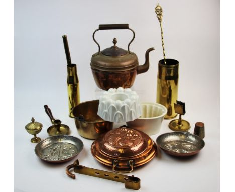 A collection of early 20th century later brass wares, to include, three copper coloured moulds, one depicting love birds, amm