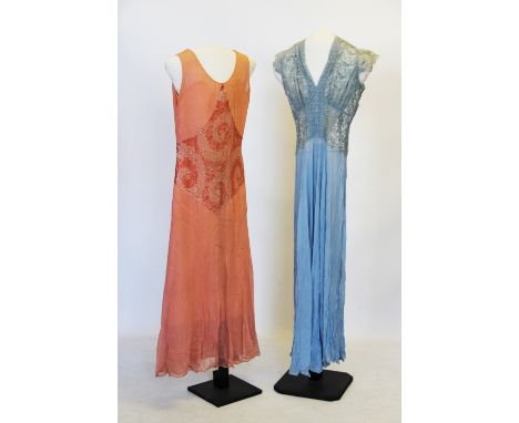 A collection of early 20th century lady's clothing, to include, a duck egg blue dress with foliate embroidered net bodice wit