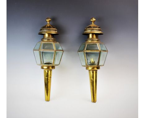 A pair of 19th century brass lacquered carriage lamps by Limehouse Lamp Co, with a circular fan shaped chimney above hexagona