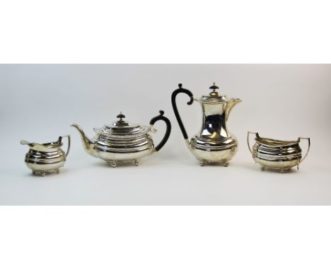 A silver tea service, Lowe &amp; Son, Chester 1958, comprising: a tea pot, a coffee pot, 22.5cm high, a sugar bowl and cream 