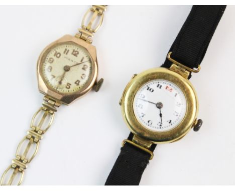 A lady's continental 18ct gold vintage wristwatch, the round white dial with Arabic numerals, set to a plain polished outer c