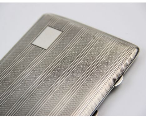 A silver cigarette case, John Rose, Birmingham 1943, of rectangular form, with striped and engine turned decoration, with vac