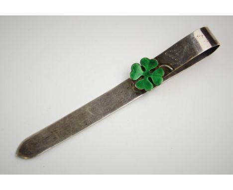 A German silver and enamelled bookmark, engraved 'Cissy' and dated '31.8.04', decorated with a guilloche enamelled green sham