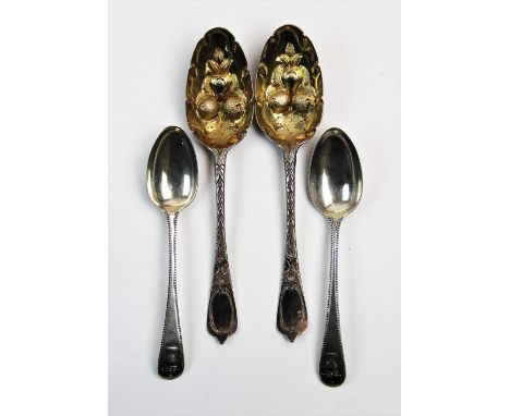 A pair of silver spoons, maker mark 'JJ', London 1739, with urn cast terminals and beaded rims, each 7cm long, with a further