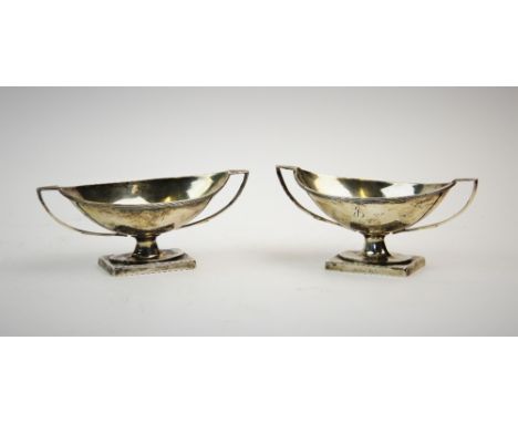 A pair of Victorian silver salts, Nathan &amp; Hayes, Birmingham 1892, each of navette shape, with reeded rims and upon recta