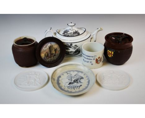 An early 19th century boat shaped tea pot, with applied black and white rural landscape scenes and pagoda shaped finial, two 