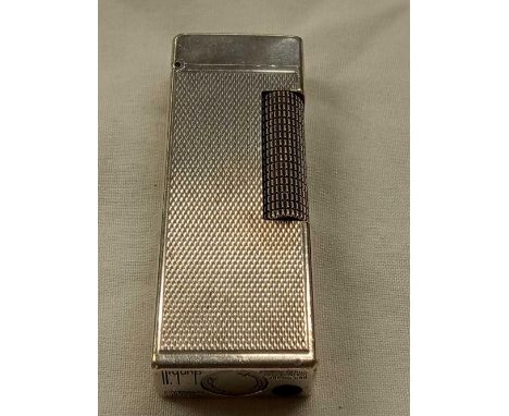 A DUNHILL LIGHTER MADE IN SWITZERLAND 