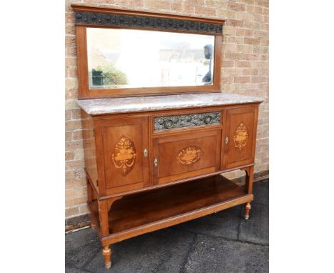 AN UNUSUAL EDWARDIAN MARBLE TOP MIRROR BACK SIDEBOARD  with floral embossed metal frieze and matching drawer, the base with m