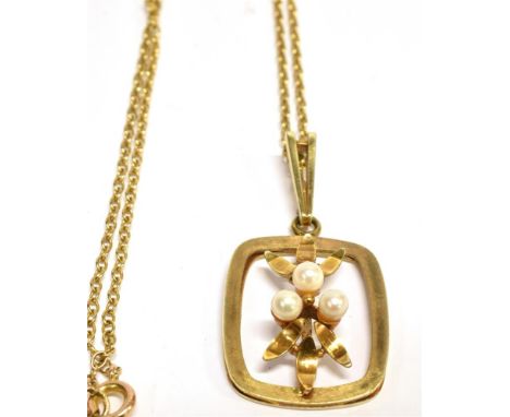 A 9CT GOLD CULTURED PEARL SET PENDANT AND CHAIN  the openwork cushion shaped pendant with three small cultured pearls to cent