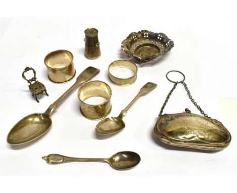 AN ASSORTED LOT OF SMALL SILVER ITEMS  comprising a finger purse, three napkin rings, a churn pepperette, a chair, three spoo