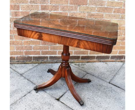 A REPRODUCTION MAHOGANY CARD TABLE  on quatrefoil base, 85cm wide