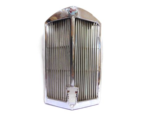 AUTOMOBILIA - A TRIUMPH CHROME RADIATOR  with an inset enamel globe badge, 67cm high.